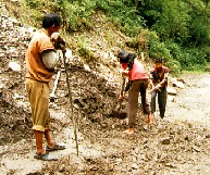 men working landslide